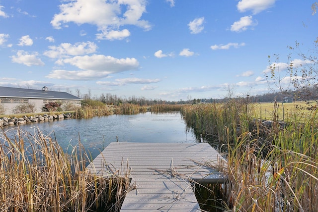 view of dock featuring a water view