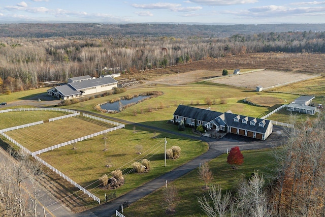 aerial view featuring a rural view and a water view