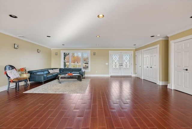 living room featuring french doors, ornamental molding, and dark wood-type flooring