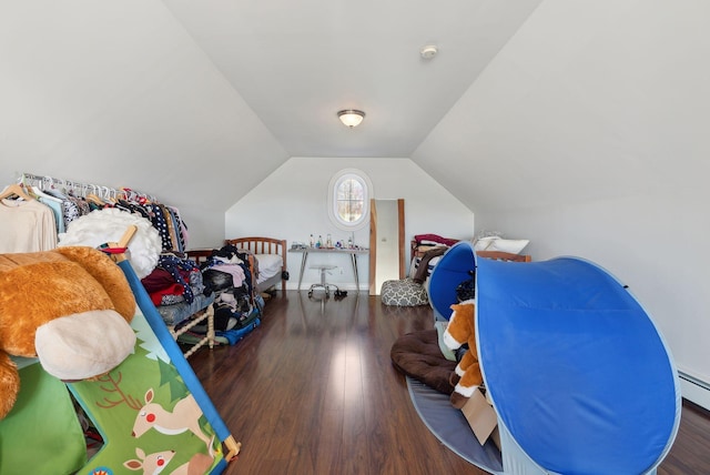 rec room featuring vaulted ceiling and dark hardwood / wood-style flooring