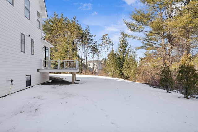 view of yard covered in snow