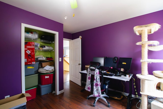 office featuring dark wood-type flooring and ceiling fan