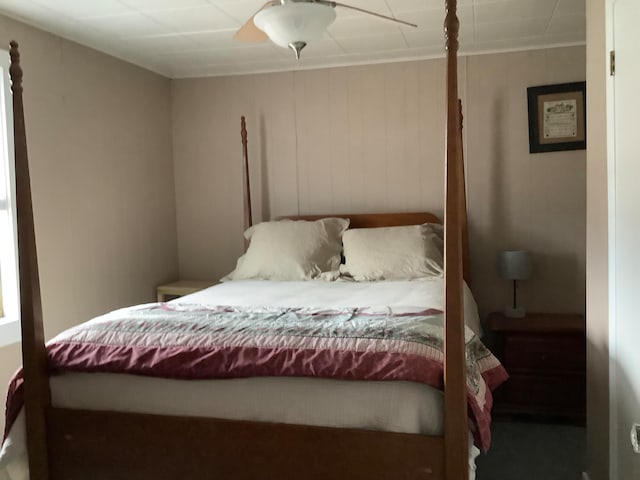 bedroom featuring crown molding and ceiling fan