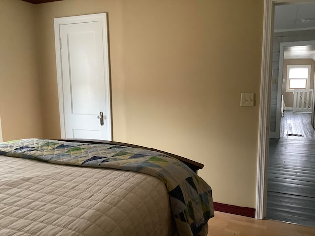 bedroom featuring hardwood / wood-style flooring