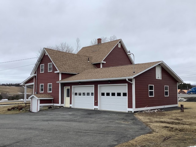 view of home's exterior featuring a garage