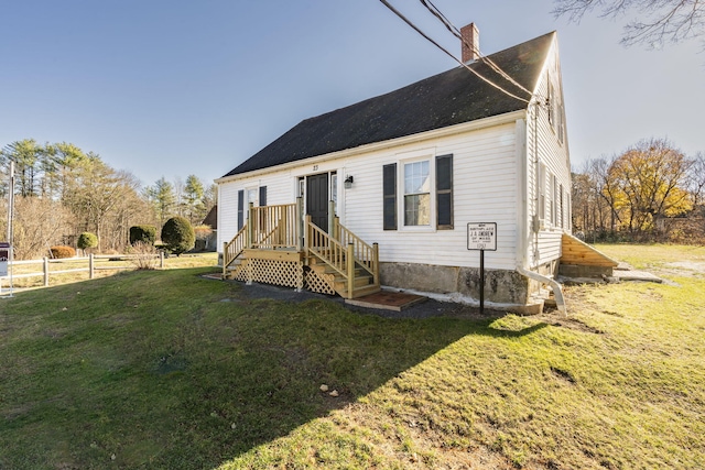 view of front of home with a front yard