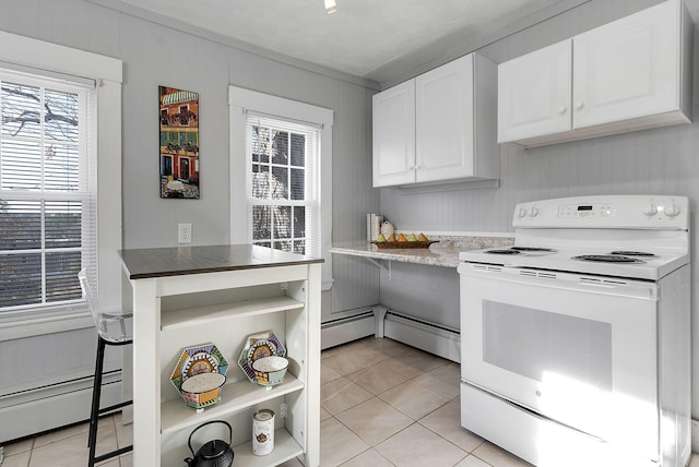 kitchen featuring white cabinetry, baseboard heating, light tile patterned flooring, and white electric range oven