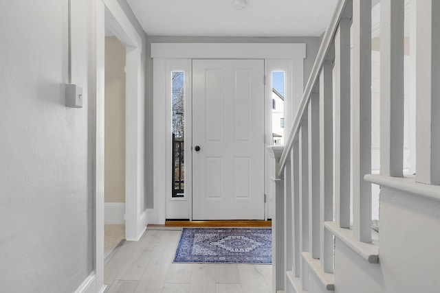 foyer entrance featuring light wood-type flooring