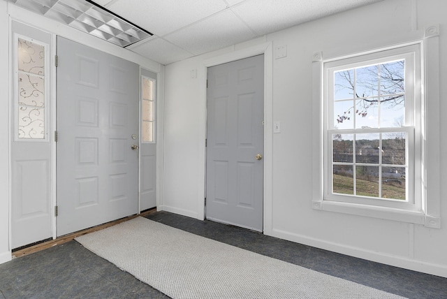 entrance foyer featuring a paneled ceiling