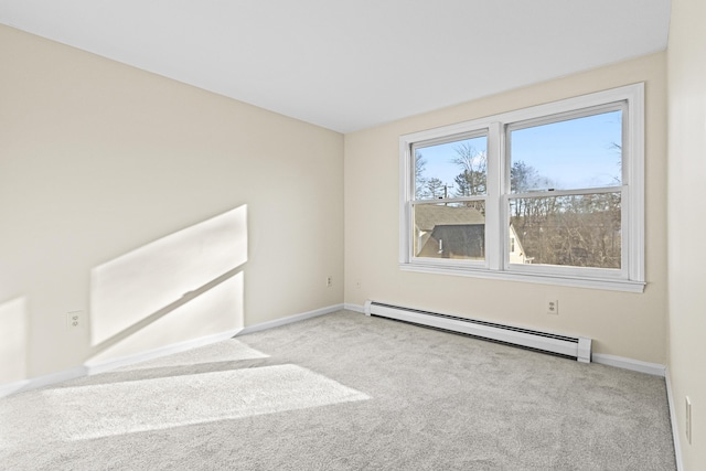 carpeted empty room featuring a baseboard radiator