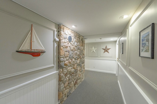 hallway featuring carpet flooring