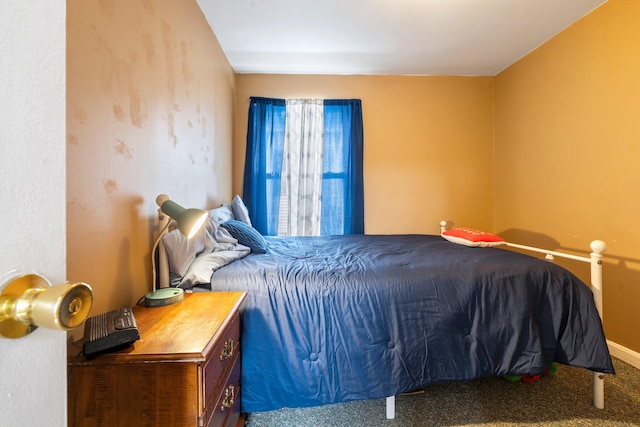 bedroom featuring carpet