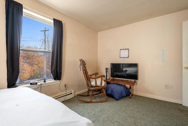 carpeted bedroom featuring baseboard heating and multiple windows