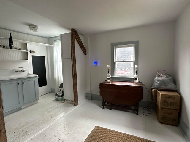 interior space featuring sink and concrete floors