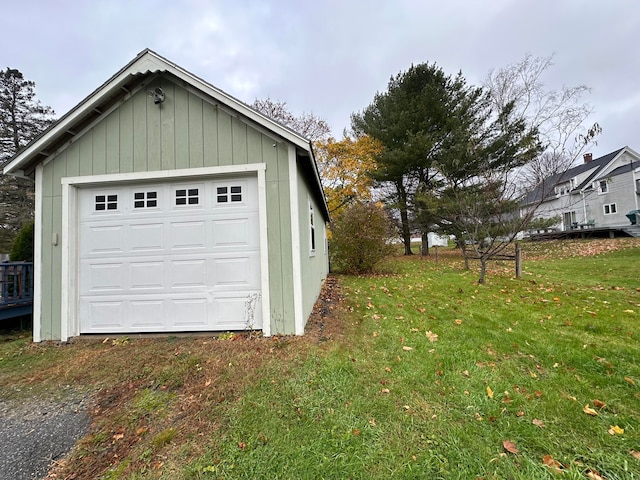 garage with a lawn