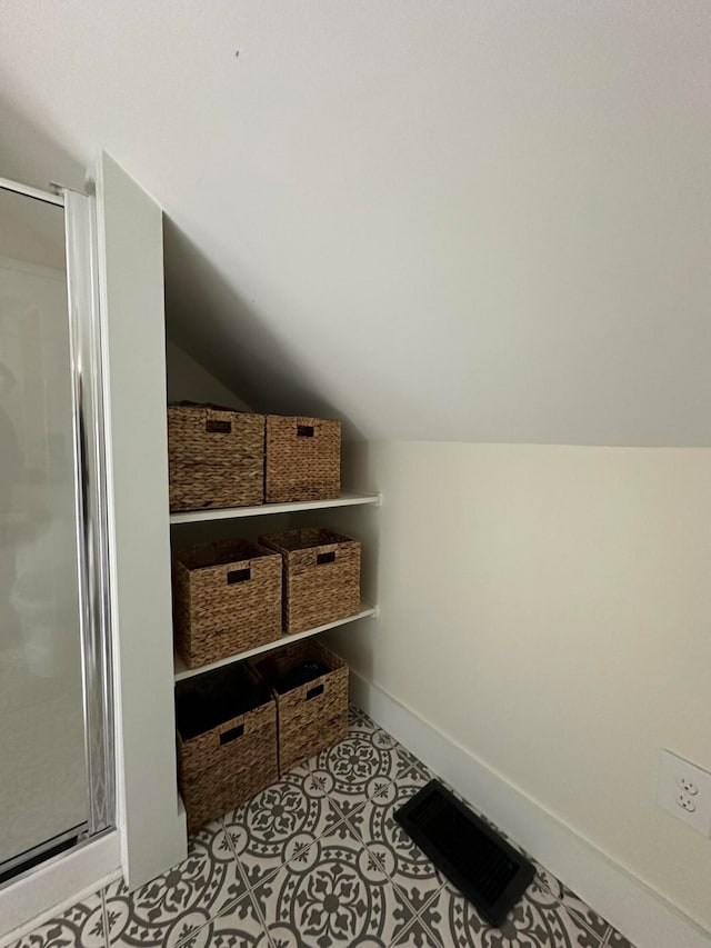 mudroom with vaulted ceiling