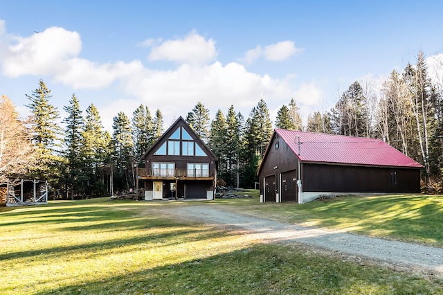 exterior space with an outdoor structure and a front yard