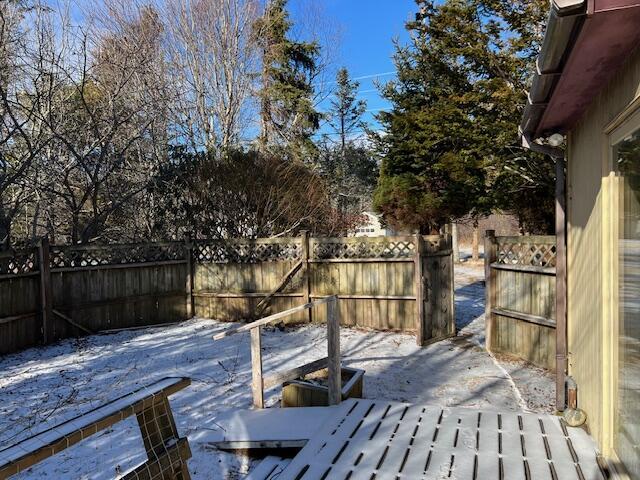 view of snow covered deck