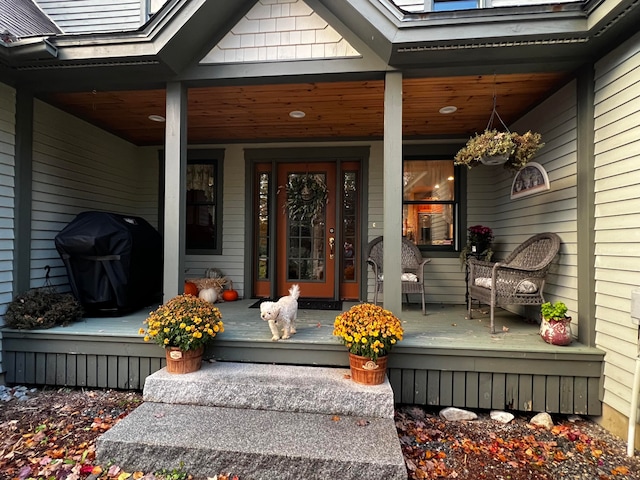 doorway to property featuring covered porch