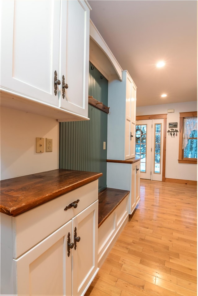 corridor featuring light hardwood / wood-style flooring