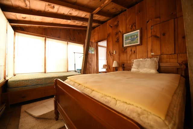 55 Lakeshore Dr, Casco, ME 04015 - bedroom with multiple windows, wooden walls, and wooden ceiling