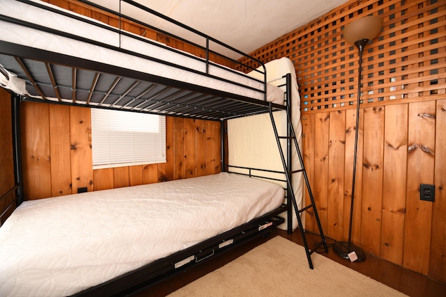 55 Lakeshore Dr, Casco, ME 04015 - bedroom featuring carpet and wood walls
