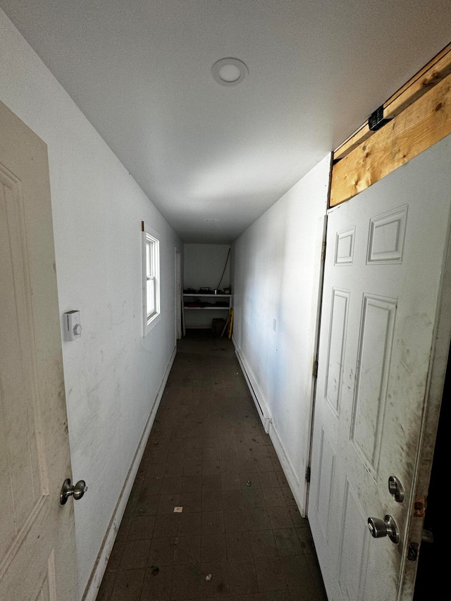 hallway featuring a baseboard radiator