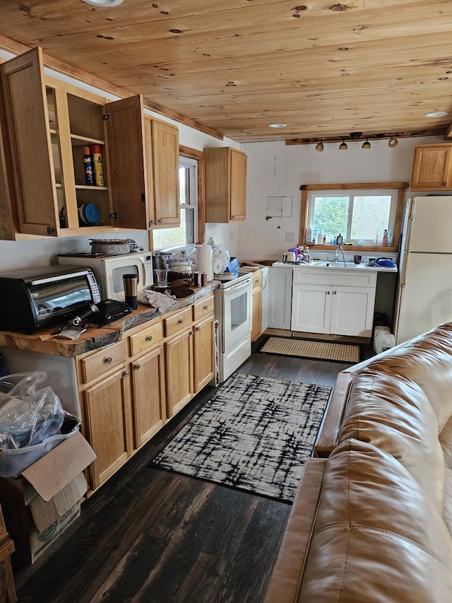 kitchen with wooden ceiling, white appliances, sink, and dark hardwood / wood-style flooring