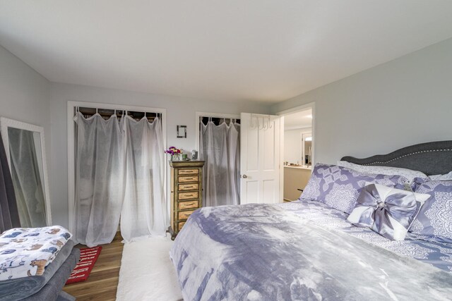 bedroom featuring dark hardwood / wood-style floors