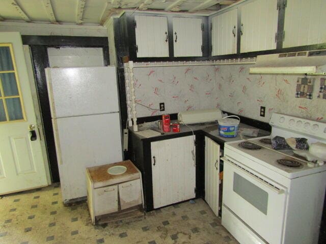 kitchen with white cabinets, white appliances, and ventilation hood