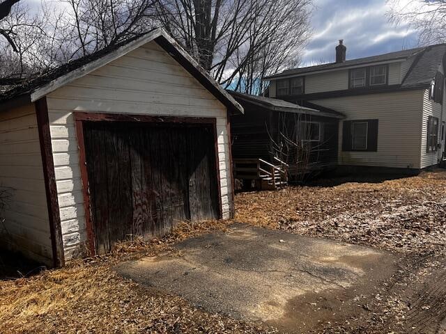 view of outdoor structure with a garage