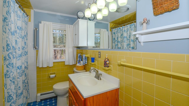 bathroom featuring vanity, a shower with shower curtain, toilet, baseboard heating, and tile walls