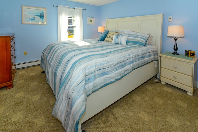 bedroom with carpet floors and a baseboard radiator