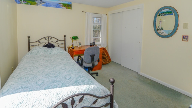 bedroom with carpet flooring and a closet