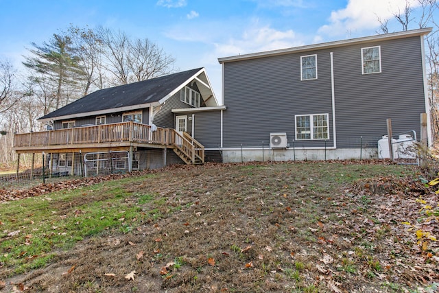 back of property featuring a wooden deck and ac unit