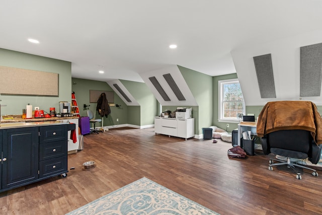 office area featuring dark wood-type flooring and lofted ceiling