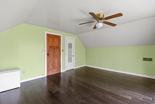 additional living space with ceiling fan, dark hardwood / wood-style floors, and lofted ceiling