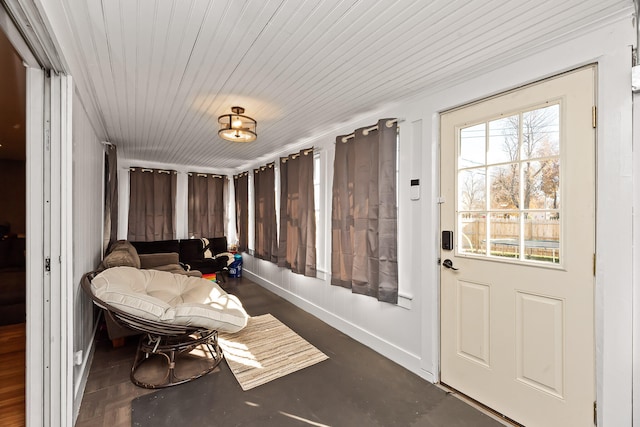 sunroom / solarium featuring wooden ceiling