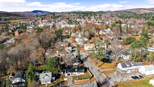 drone / aerial view featuring a mountain view