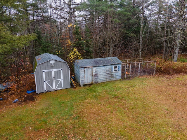 view of outdoor structure featuring a lawn