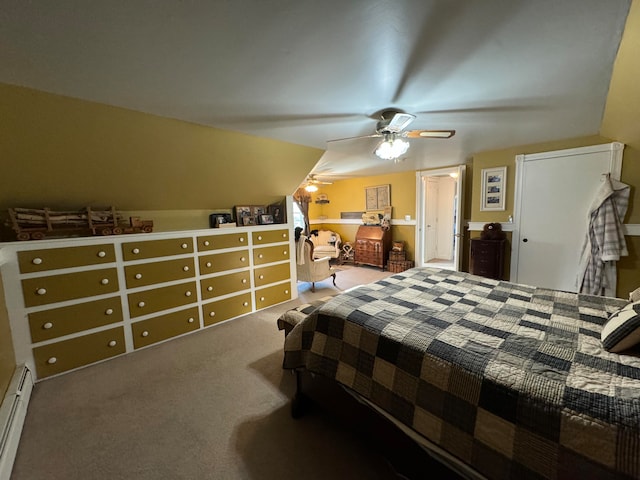 bedroom featuring carpet flooring, ceiling fan, and a baseboard heating unit