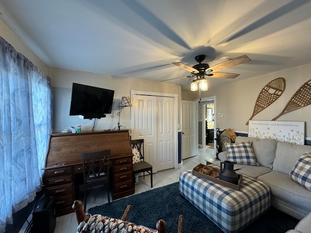 living room featuring ceiling fan