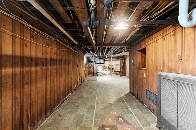 basement with wood walls