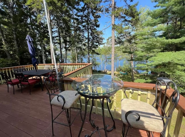 deck featuring a water view