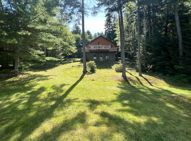 view of yard with a deck