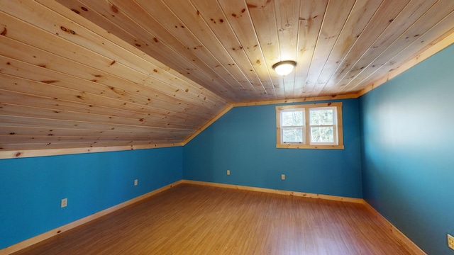 bonus room featuring hardwood / wood-style flooring, vaulted ceiling, and wooden ceiling