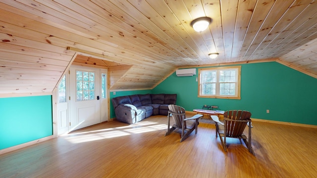 additional living space featuring a wall mounted AC, lofted ceiling, a healthy amount of sunlight, and wooden ceiling