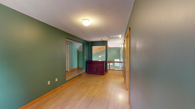 hallway featuring light hardwood / wood-style flooring