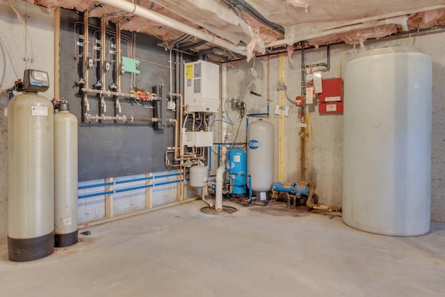 utility room with gas water heater