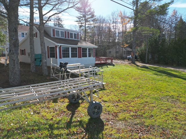 view of yard featuring a wooden deck